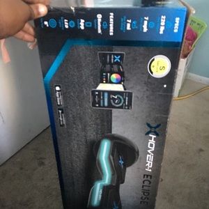 Roomba robot vacuum and a hover board